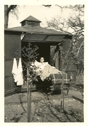 A tuberculosis patient in a hut at Papworth Village Settlement, 1932